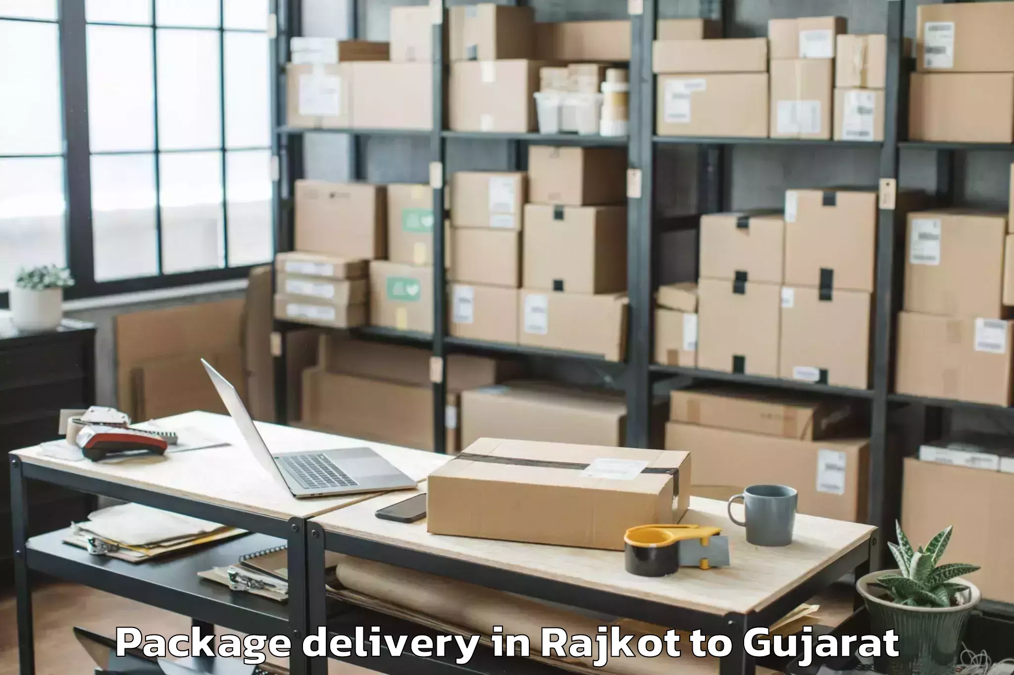 Trusted Rajkot to Swarnim Gujarat Sports Univers Package Delivery